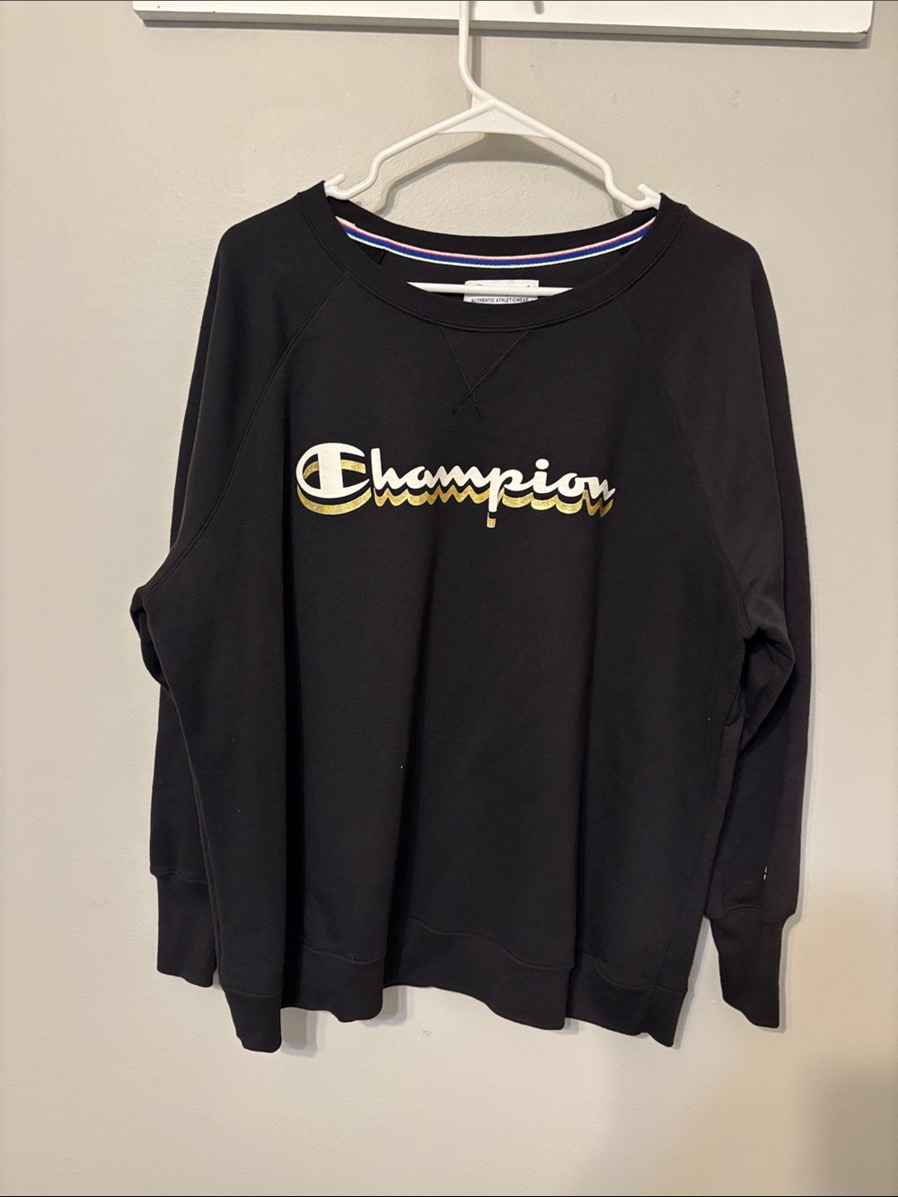 Champion Black Crewneck Sweatshirt with White and Gold Script Logo